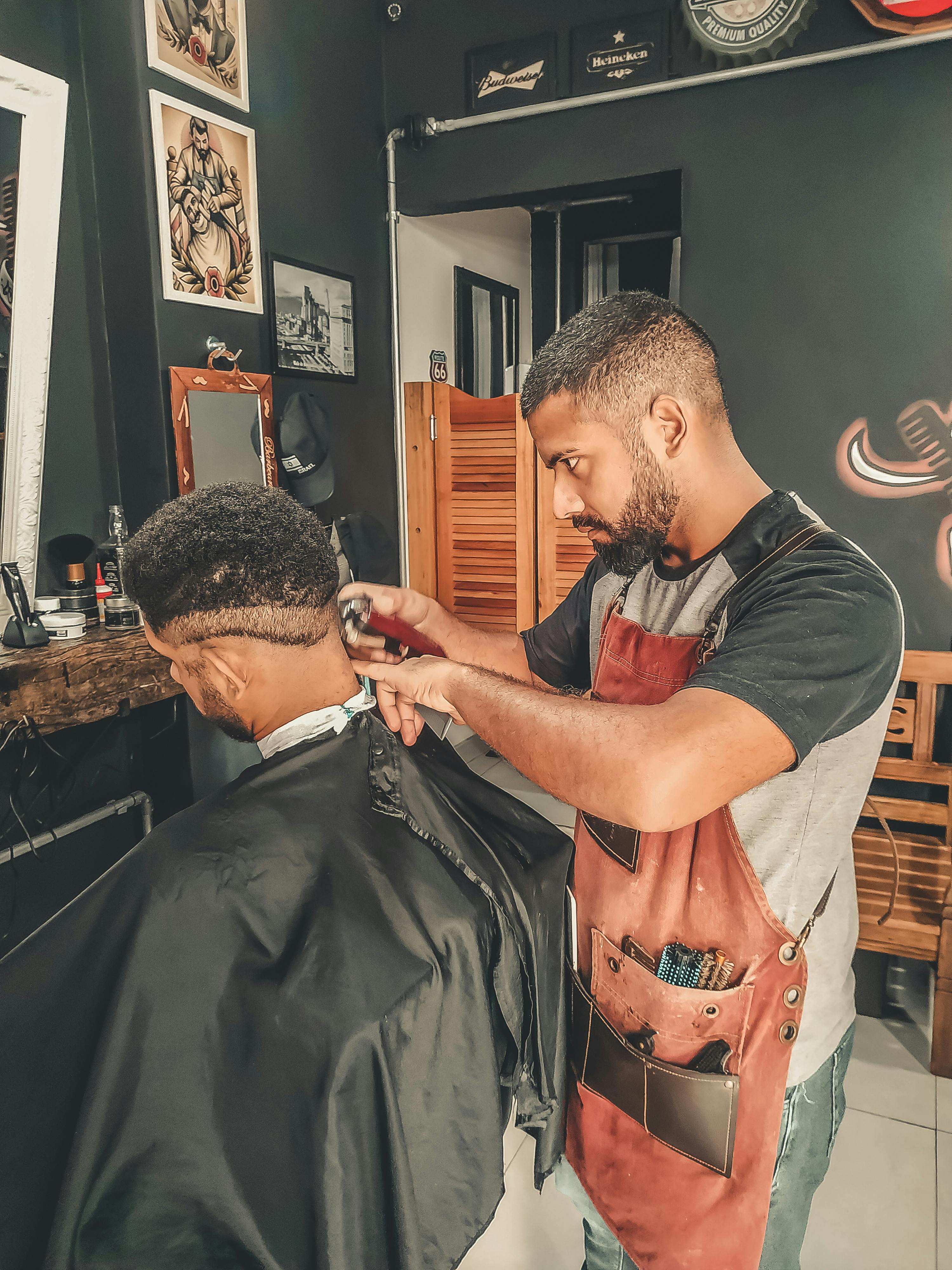 barbers cutting hair